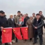 Қытай елінің туын өртеген 12 адам қамауға алынды