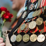 Астана мен Алматыда Отан соғысының ардагерлеріне төлемақы берілді