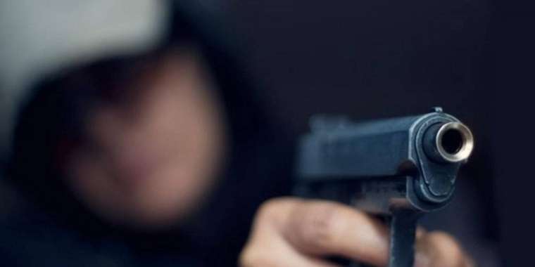 Үш адамды атып өлтірген қылмыскер өмір бойына сотталды